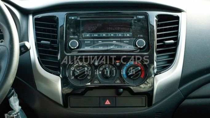 New Mitsubishi L200 V Facelift, 2.4 l, 2023 in Sharjah by Nour Alnukhba Motors, White color. European Specs | AUTO.AE