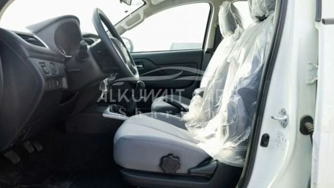 New Mitsubishi L200 V Facelift, 2.4 l, 2023 in Sharjah by Nour Alnukhba Motors, White color. European Specs | AUTO.AE