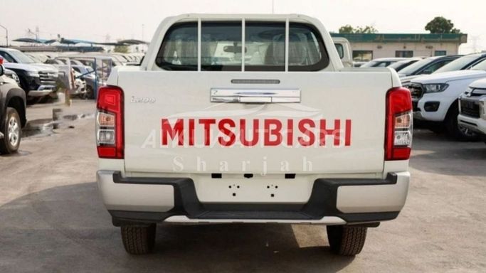 New Mitsubishi L200 V Facelift, 2.4 l, 2023 in Sharjah by Nour Alnukhba Motors, White color. European Specs | AUTO.AE