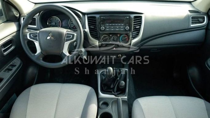 New Mitsubishi L200 V Facelift, 2.4 l, 2023 in Sharjah by Nour Alnukhba Motors, White color. European Specs | AUTO.AE