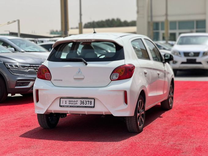Used Mitsubishi Mirage VI Facelift 2, 1.2 l, 2023 in Sharjah by Al Aram Cars, White color. GCC Specs | AUTO.AE