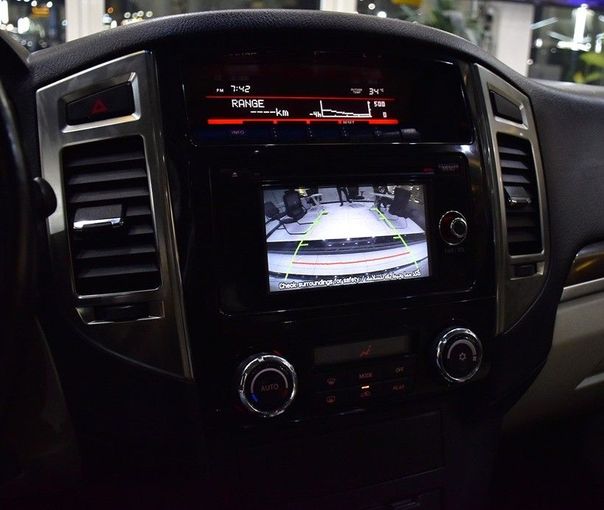 Used Mitsubishi Pajero IV Facelift 2, 3.0 l, 2022 in Sharjah by Honey Gidosha Used Cars Tr., Burgundy color.  | AUTO.AE