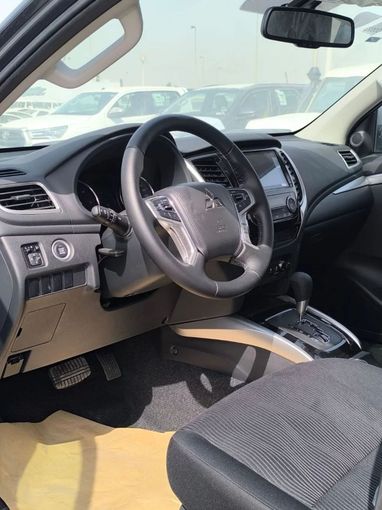 Новый Mitsubishi Pajero Sport III Рестайлинг, 2.4 л, 2025 в Шардже от Nour Alnukhba Motors Черный цвет. GCC | AUTO.AE