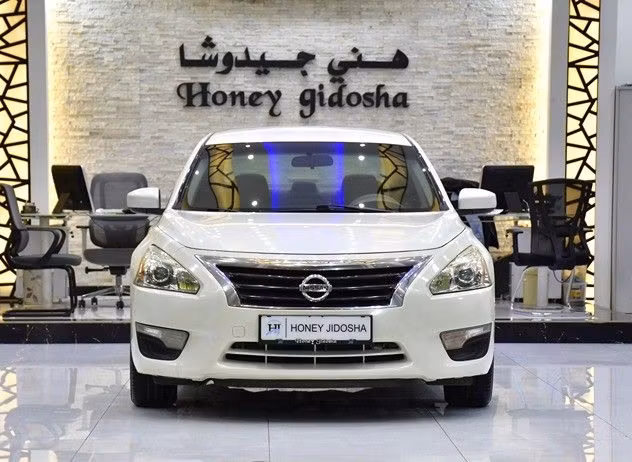 Подержанный Nissan Altima V (L33), 2.5 л, 2015 в Шардже от Honey Gidosha Used Cars Tr. Белый цвет.  | AUTO.AE
