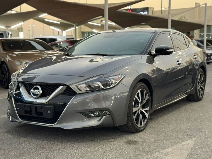 Подержанный Nissan Maxima VIII (A36), 3.5 л, 2016 в Шардже от Nour Alnukhba Motors Серый цвет. Корейская | AUTO.AE