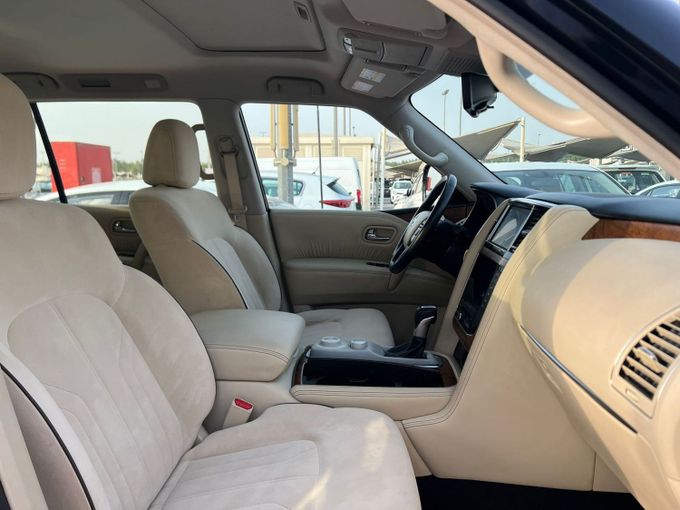 Подержанный Nissan Patrol VI (Y62) Рестайлинг 2, 4.0 л, 2021 в Шардже от Al Aram Cars Черный цвет. GCC | AUTO.AE