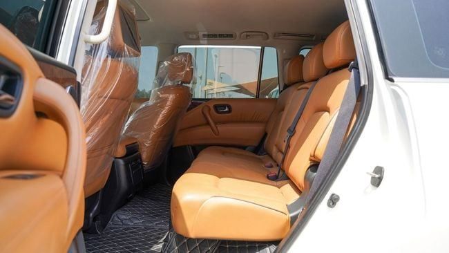 Used Nissan Patrol VI (Y62), 5.6 l, 2014 in Sharjah by Alnujoom Al Malakiah Used Cars, White color. GCC Specs | AUTO.AE