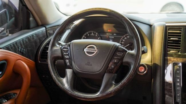 Used Nissan Patrol VI (Y62) Facelift 2, 5.6 l, 2020 in Sharjah by Alnujoom Al Malakiah Used Cars, White color. GCC Specs | AUTO.AE