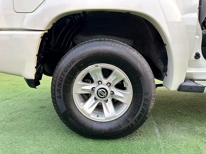 Подержанный Nissan Patrol V (Y61) Рестайлинг, 4.8 л, 2022 в Шардже от Ahmad alkhodari Motors Белый цвет. GCC | AUTO.AE