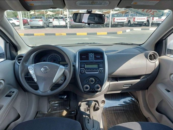 Подержанный Nissan Sunny N17 Рестайлинг, 1.5 л, 2017 в Шардже от Alhamoor Used Cars Белый цвет. GCC | AUTO.AE