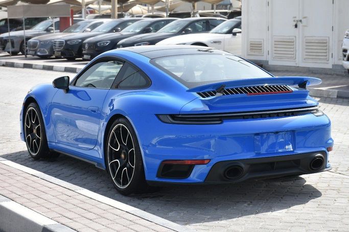 مستعملة Porsche 911 Turbo VIII (992), 3.7 l, 2023 في في الشارقة من Alfaris Used Cars، اللون أزرق.  | AUTO.AE