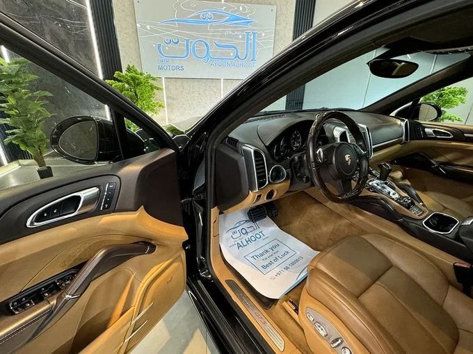 Used Porsche Cayenne GTS II Facelift (958), 3.6 l, 2014 in Sharjah by Ayoon Alhoot Motors, Black color. GCC Specs | AUTO.AE
