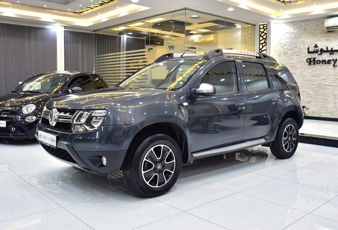Подержанный Renault Duster I Рестайлинг, 2.0 л, 2017 в Шардже от Honey Gidosha Used Cars Tr. Серый цвет.  | AUTO.AE