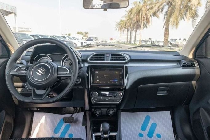 Новый Suzuki DZire III Рестайлинг, 1.2 л, 2024 в Шардже от Nour Alnukhba Motors Серебристый цвет. Other | AUTO.AE
