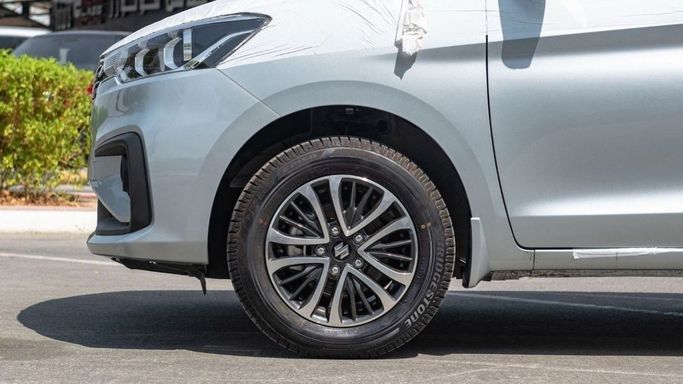 New Suzuki Ertiga II Facelift, 1.5 l, 2023 in Sharjah by Nour Alnukhba Motors, Silver color. Other | AUTO.AE