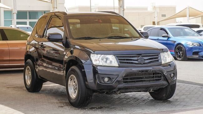Подержанный Suzuki Grand Vitara III Рестайлинг 2, 2.4 л, 2015 в Шардже от Abo Saif Черный цвет. GCC | AUTO.AE