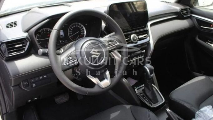 New Suzuki Grand Vitara III, 1.5 l, 2023 in Sharjah by Nour Alnukhba Motors, White color. GCC Specs | AUTO.AE
