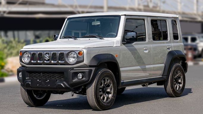 New Suzuki Jimny IV, 1.5 l, 2025 in Sharjah by Nour Alnukhba Motors, Silver color. GCC Specs | AUTO.AE