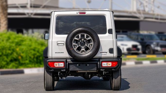 New Suzuki Jimny IV, 1.5 l, 2025 in Sharjah by Nour Alnukhba Motors, Silver color. GCC Specs | AUTO.AE