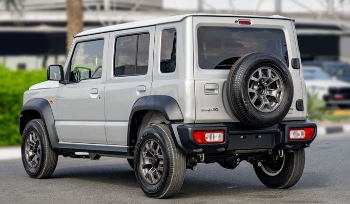 Новый Suzuki Jimny IV, 1.5 л, 2025 в Шардже от Nour Alnukhba Motors Серый цвет. Other | AUTO.AE