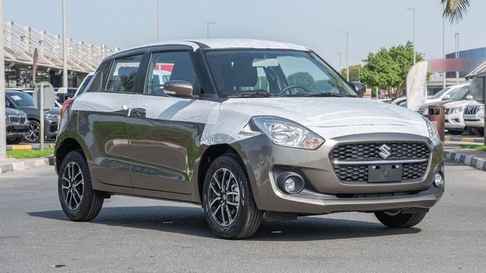 Новый Suzuki Swift VI, 1.2 л, 2023 в Шардже от Nour Alnukhba Motors Бронзовый цвет. Other | AUTO.AE