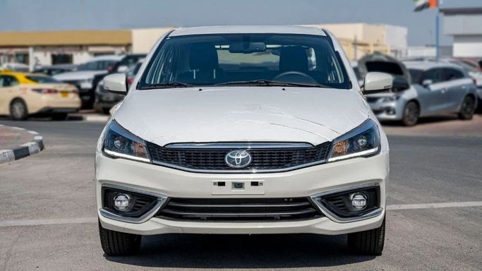 New Toyota Belta II, 1.5 l, 2023 in Sharjah by Nour Alnukhba Motors, White color. Other | AUTO.AE