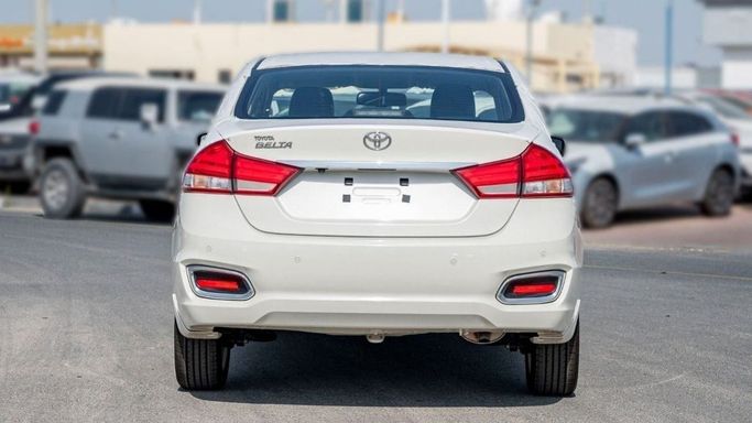 New Toyota Belta II, 1.5 l, 2023 in Sharjah by Nour Alnukhba Motors, White color. Other | AUTO.AE