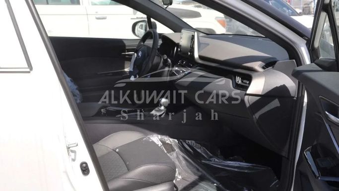 New Toyota C-HR I Facelift, 1.8 l, 2023 in Sharjah by Nour Alnukhba Motors, White color. Other | AUTO.AE