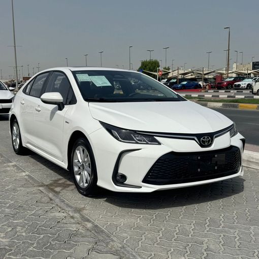 Новый Toyota Corolla Sporty XII (E210) Рестайлинг, 1.8 л, 2025 в Шардже от Alfaris Used Cars Белый цвет.  | AUTO.AE