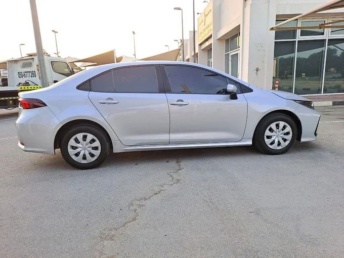 New Toyota Corolla Sporty XII (E210), 2.0 l, 2020 in Sharjah by Imad Younis Almani used Cars, Silver color. GCC Specs | AUTO.AE