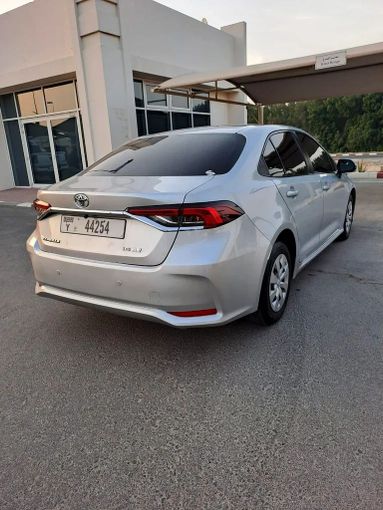 New Toyota Corolla Sporty XII (E210), 2.0 l, 2020 in Sharjah by Imad Younis Almani used Cars, Silver color. GCC Specs | AUTO.AE