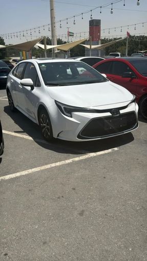 New Toyota Corolla XII (E210), 1.2 l, 2024 in Sharjah by Nour Alnukhba Motors, White color. Other | AUTO.AE