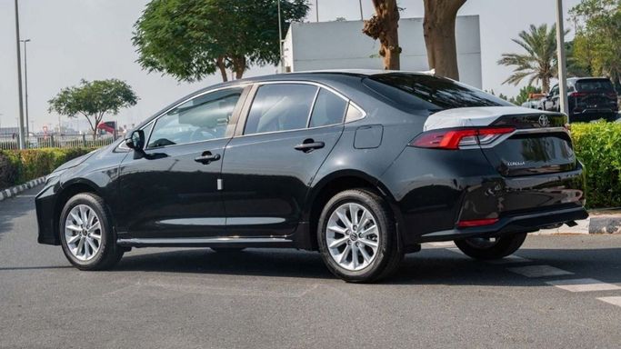 New Toyota Corolla XII (E210), 1.8 l, 2023 in Sharjah by Nour Alnukhba Motors, Black color. Other | AUTO.AE
