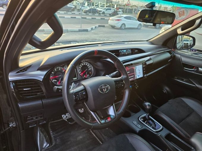 Used Toyota Hilux VIII Facelift, 2.8 l, 2023 in Sharjah by Rebou Najd Used Cars, Black color. GCC Specs | AUTO.AE