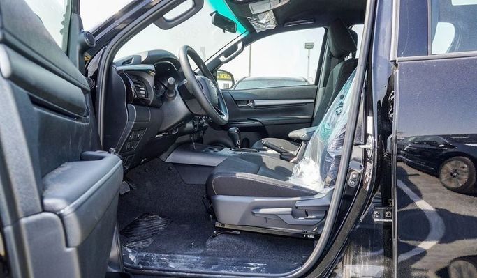 New Toyota Hilux VIII Facelift, 2.4 l, 2025 in Sharjah by Nour Alnukhba Motors, Black color. Other | AUTO.AE