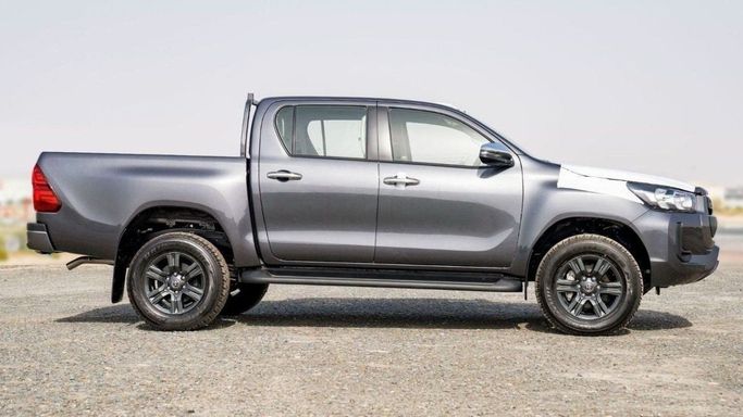 New Toyota Hilux VIII Facelift, 2.4 l, 2024 in Sharjah by Nour Alnukhba Motors, Grey color. European Specs | AUTO.AE