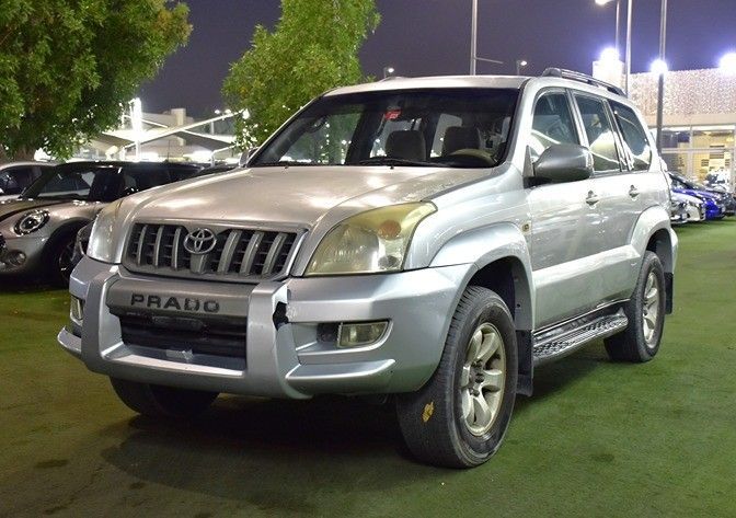 Used Toyota Land Cruiser Prado 120 Series, 4.0 l, 2005 in Sharjah by Honey Gidosha Used Cars Tr., Silver color.  | AUTO.AE