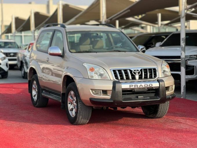 Новый Toyota Land Cruiser Prado 120 Series Рестайлинг, 2.7 л, 2009 в Шардже от Al Aram Cars Золотистый цвет. GCC | AUTO.AE