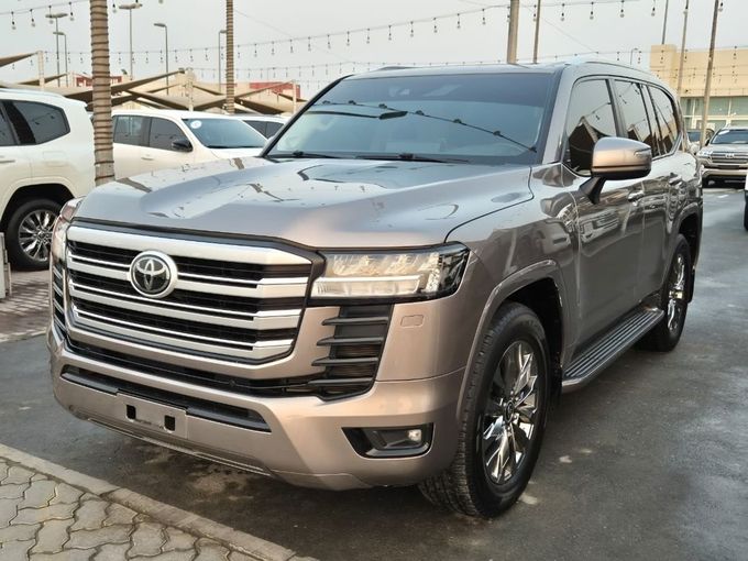 Used Toyota Land Cruiser 300 Series, 3.4 l, 2022 in Sharjah by Rebou Najd Used Cars, Brown color. GCC Specs | AUTO.AE