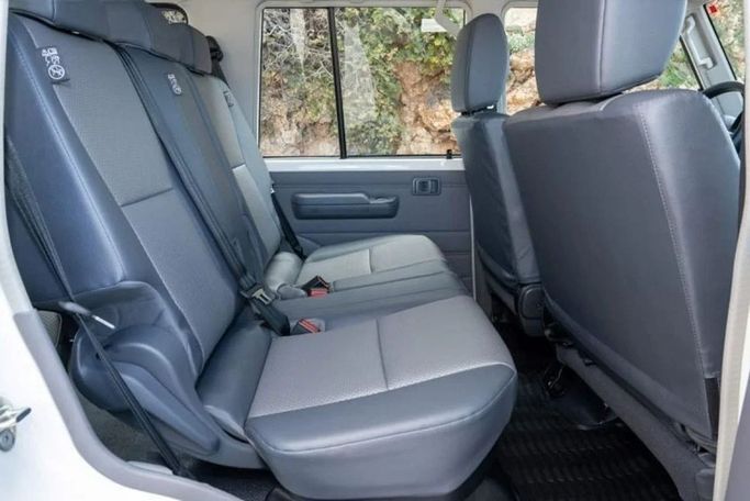 New Toyota Land Cruiser 70 Series Facelift 2, 4.2 l, 2024 in Sharjah by Nour Alnukhba Motors, White color. European Specs | AUTO.AE