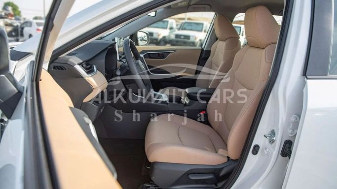 New Toyota RAV4 V (XA50), 2.5 l, 2023 in Sharjah by Nour Alnukhba Motors, White color. GCC Specs | AUTO.AE