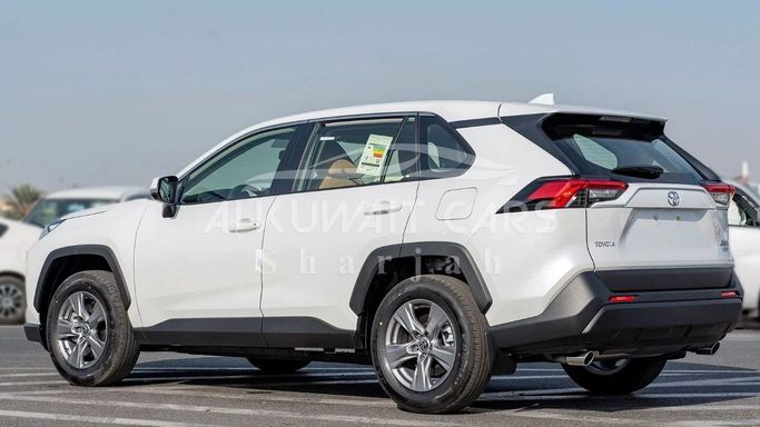 New Toyota RAV4 V (XA50), 2.5 l, 2023 in Sharjah by Nour Alnukhba Motors, White color. GCC Specs | AUTO.AE