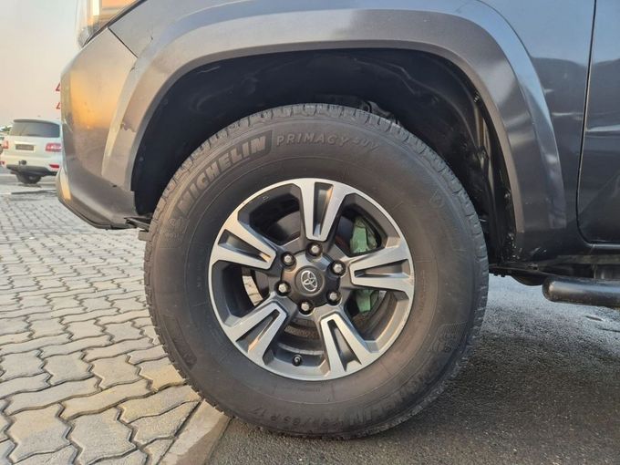 Подержанный Toyota Tacoma III, 3.5 л, 2018 в Шардже от Rebou Najd Used Cars Черный цвет. Американская | AUTO.AE