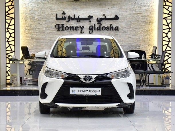 Подержанный Toyota Yaris IV, 1.5 л, 2022 в Шардже от Honey Gidosha Used Cars Tr. Белый цвет.  | AUTO.AE