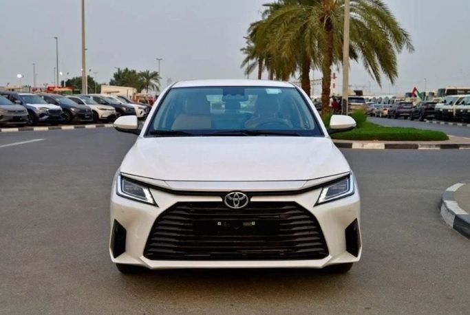 New Toyota Yaris IV, 1.5 l, 2024 in Sharjah by Nour Alnukhba Motors, White color. Other | AUTO.AE