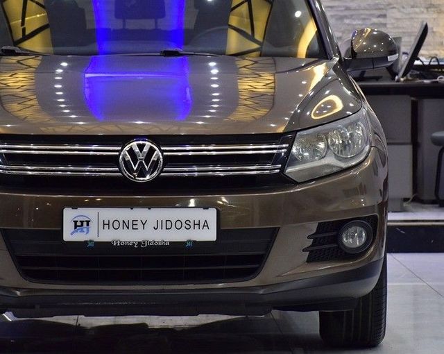 Used Volkswagen Tiguan I Facelift, 2.0 l, 2015 in Sharjah by Honey Gidosha Used Cars Tr., Brown color.  | AUTO.AE