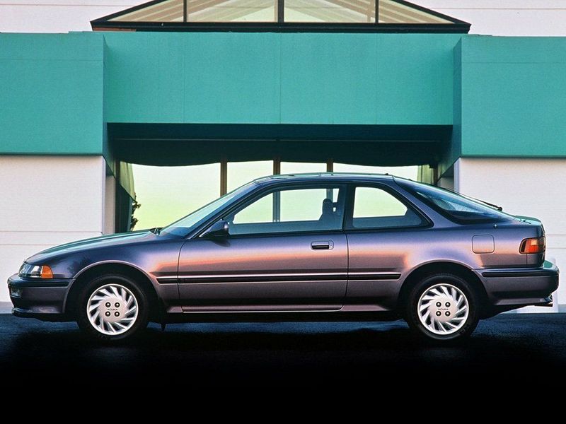 Acura Integra ثانياً، هاتشباك 3 أبواب — منظر من الجانب الأيسر