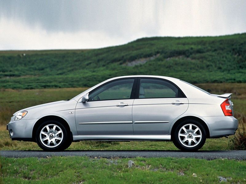 Kia Cerato أنا فيس ليفت، سيدان — منظر من الجانب الأيسر
