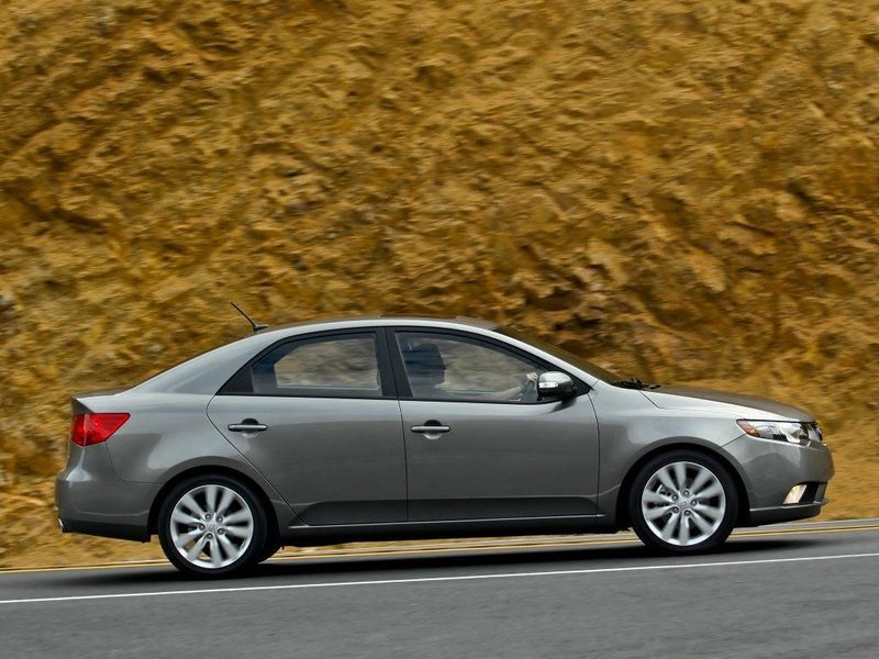 Kia Forte I، سيدان — منظر من الجانب الأيسر