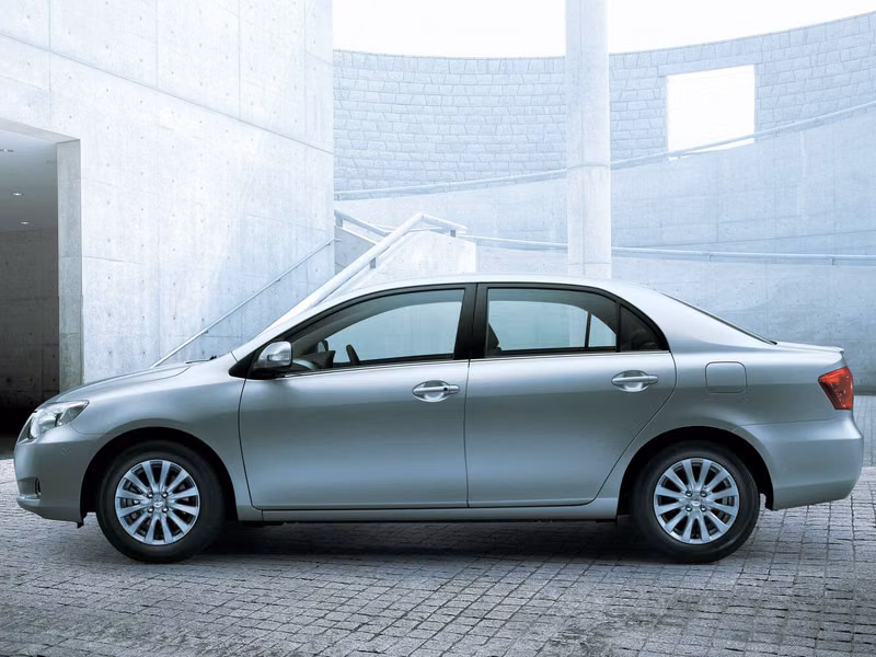 Toyota Corolla X (E140، E150)، سيدان Axio — منظر من الجانب الأيسر